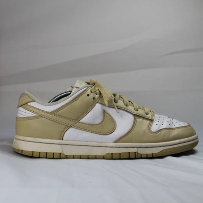 Nike Dunk Low Retro Gold, edição clássica com detalhes dourados, estilo icónico e confortável, disponíveis na Newold para os amantes de sneakers.