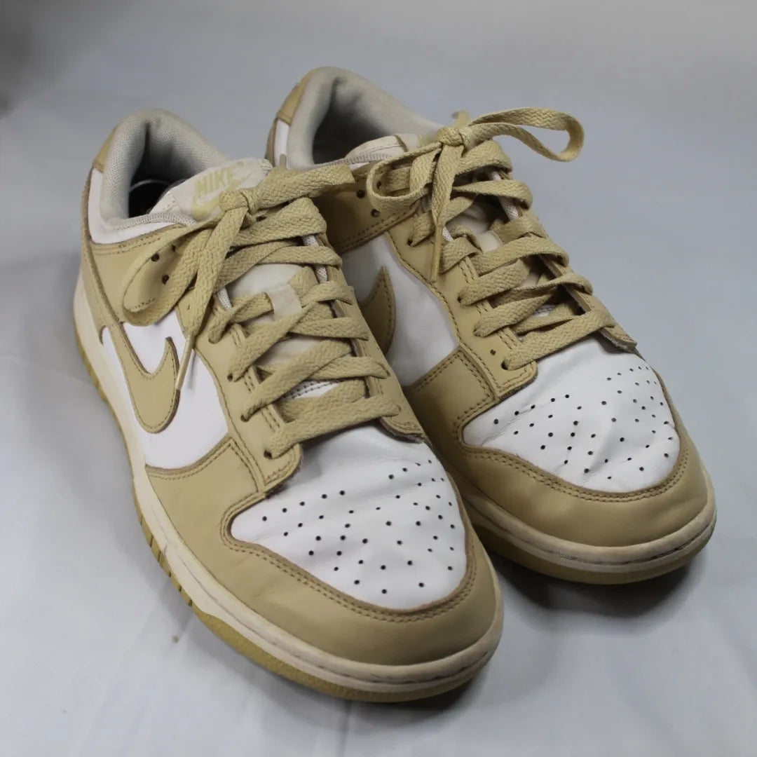 Nike Dunk Low Retro Gold, edição clássica com detalhes dourados, estilo icónico e confortável, disponíveis na Newold para os amantes de sneakers.1